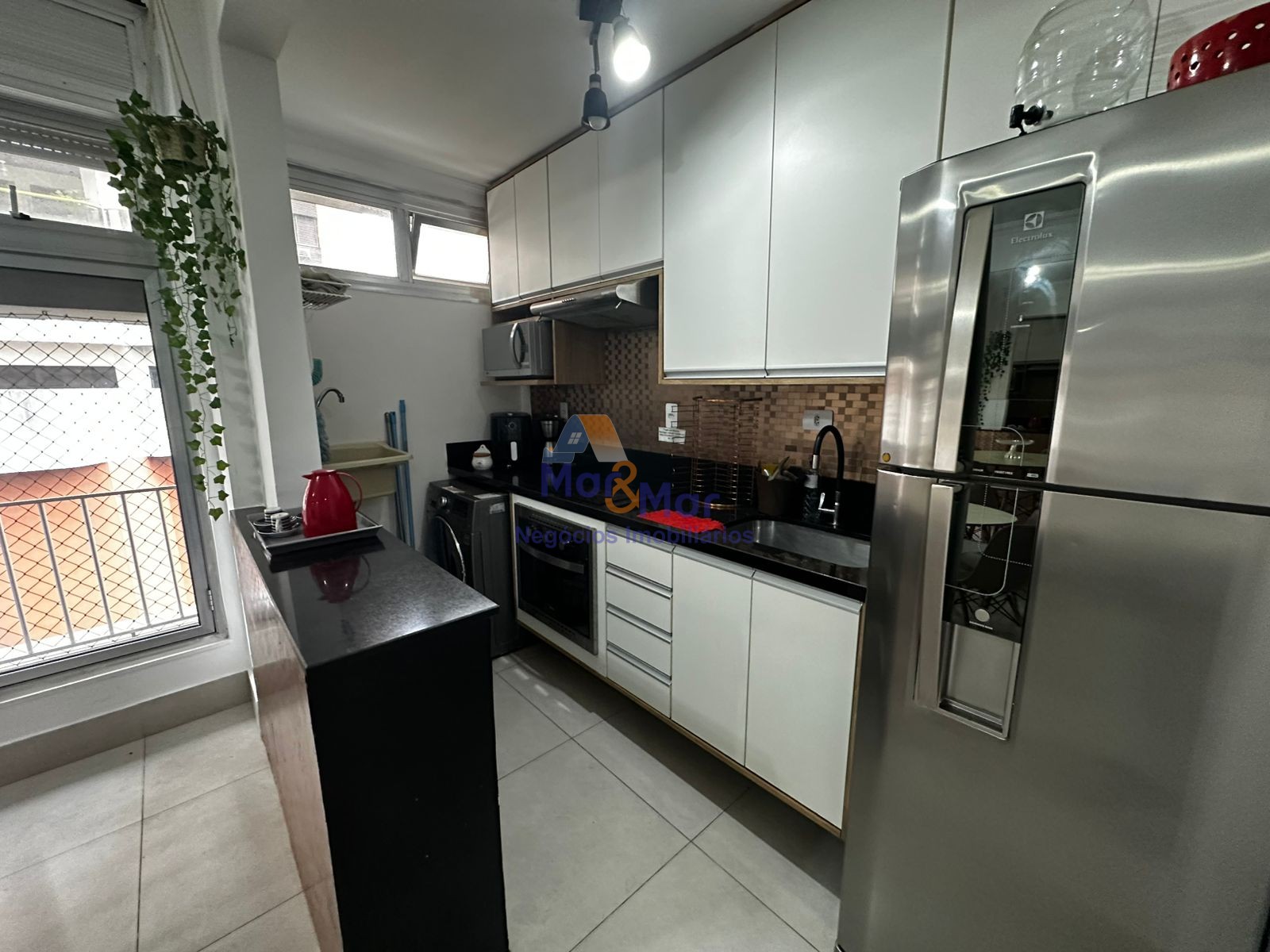 Apartamento na Praia das Pitangueiras, Guarujá - SP