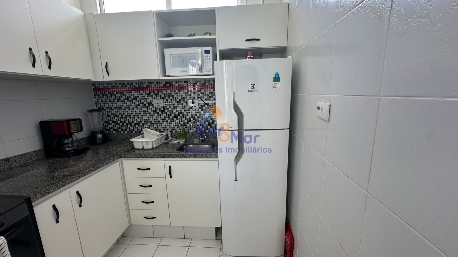 Apartamento na Praia das Pitangueiras, Guarujá - SP
