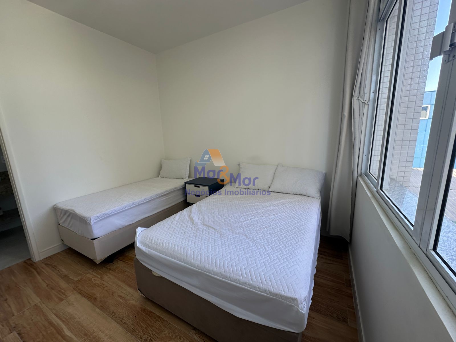 Apartamento na Praia das Pitangueiras, Guarujá - SP