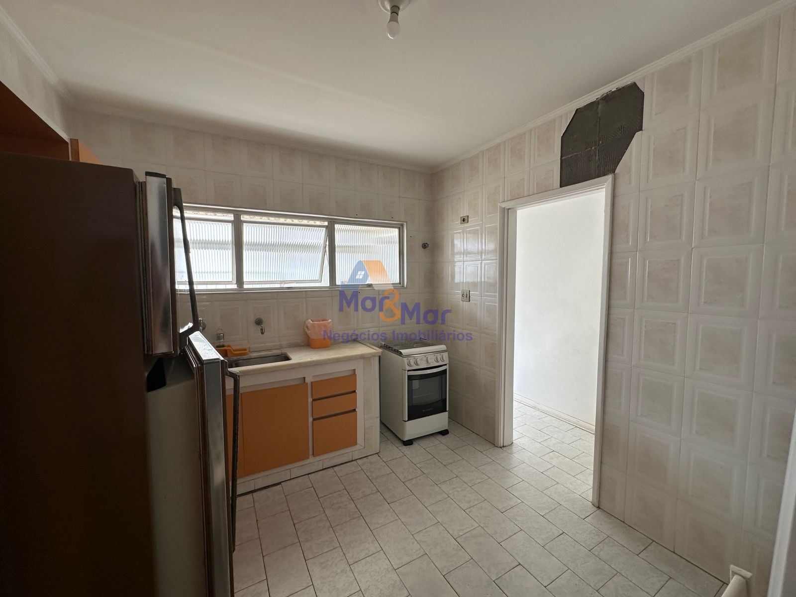 Apartamento na Praia das Pitangueiras, Guarujá - SP