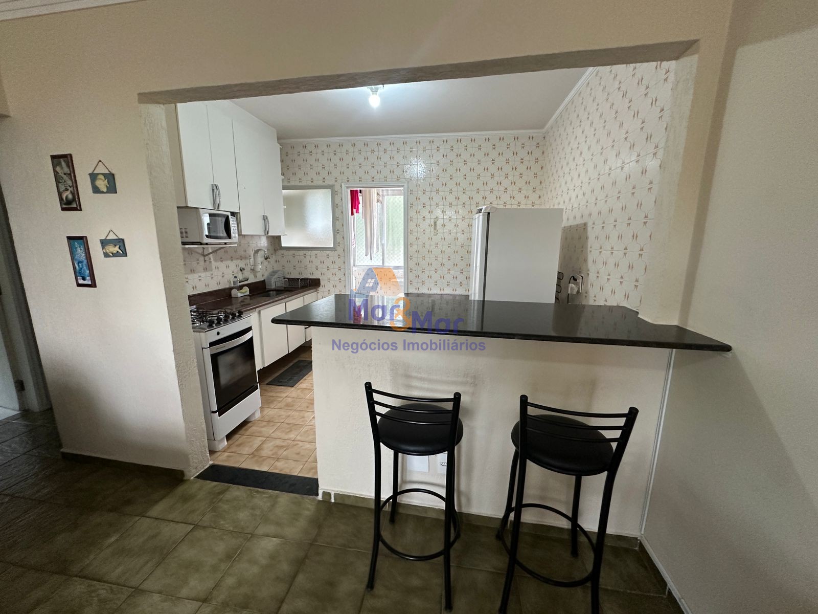 Apartamento na Praia das Pitangueiras, Guarujá - SP