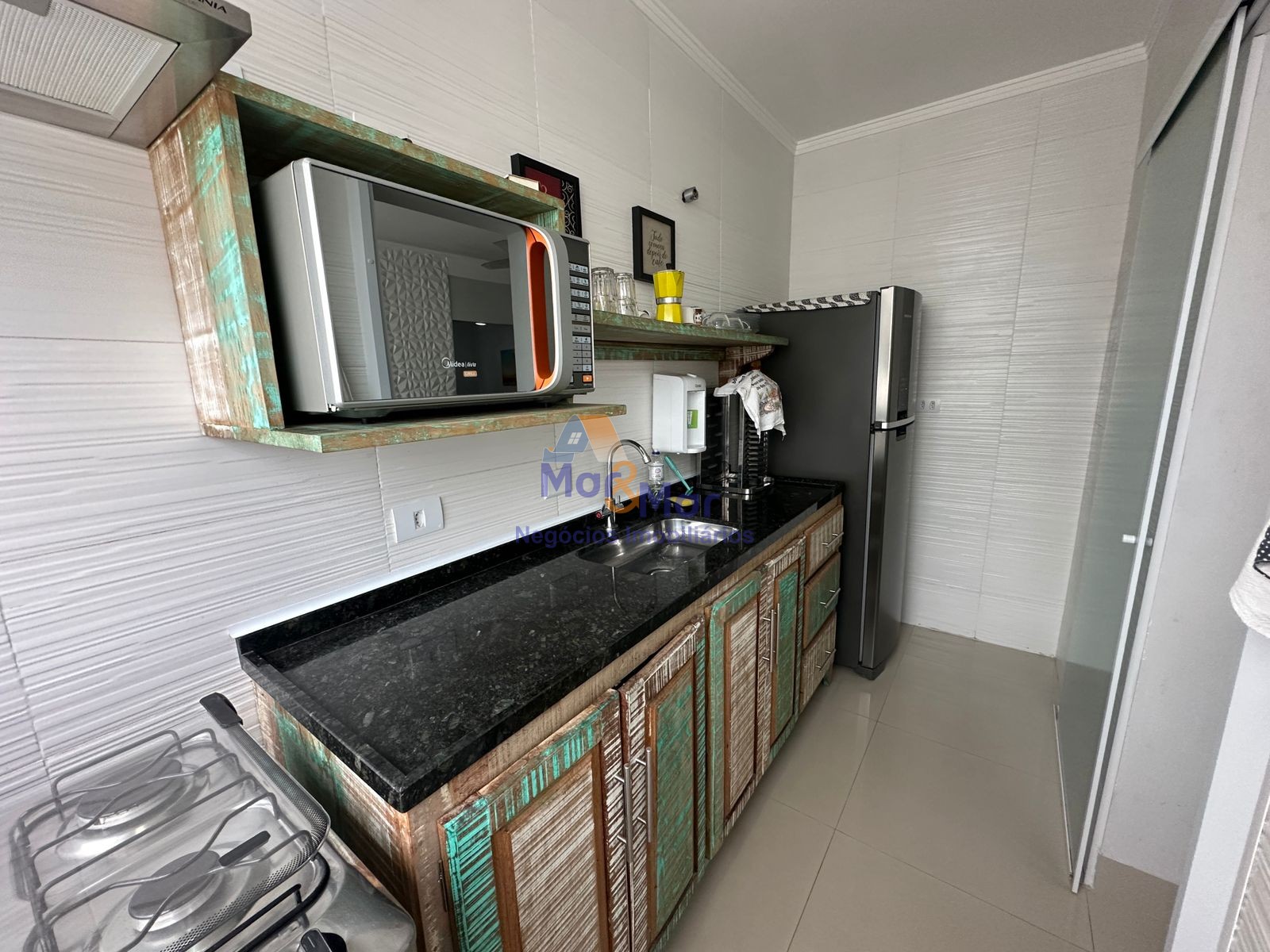 Apartamento na Praia das Pitangueiras, Guarujá - SP