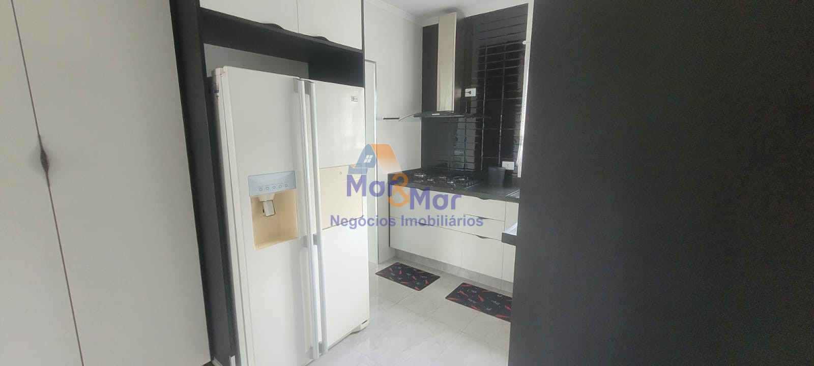 Apartamento na Praia das Pitangueiras, Guarujá - SP