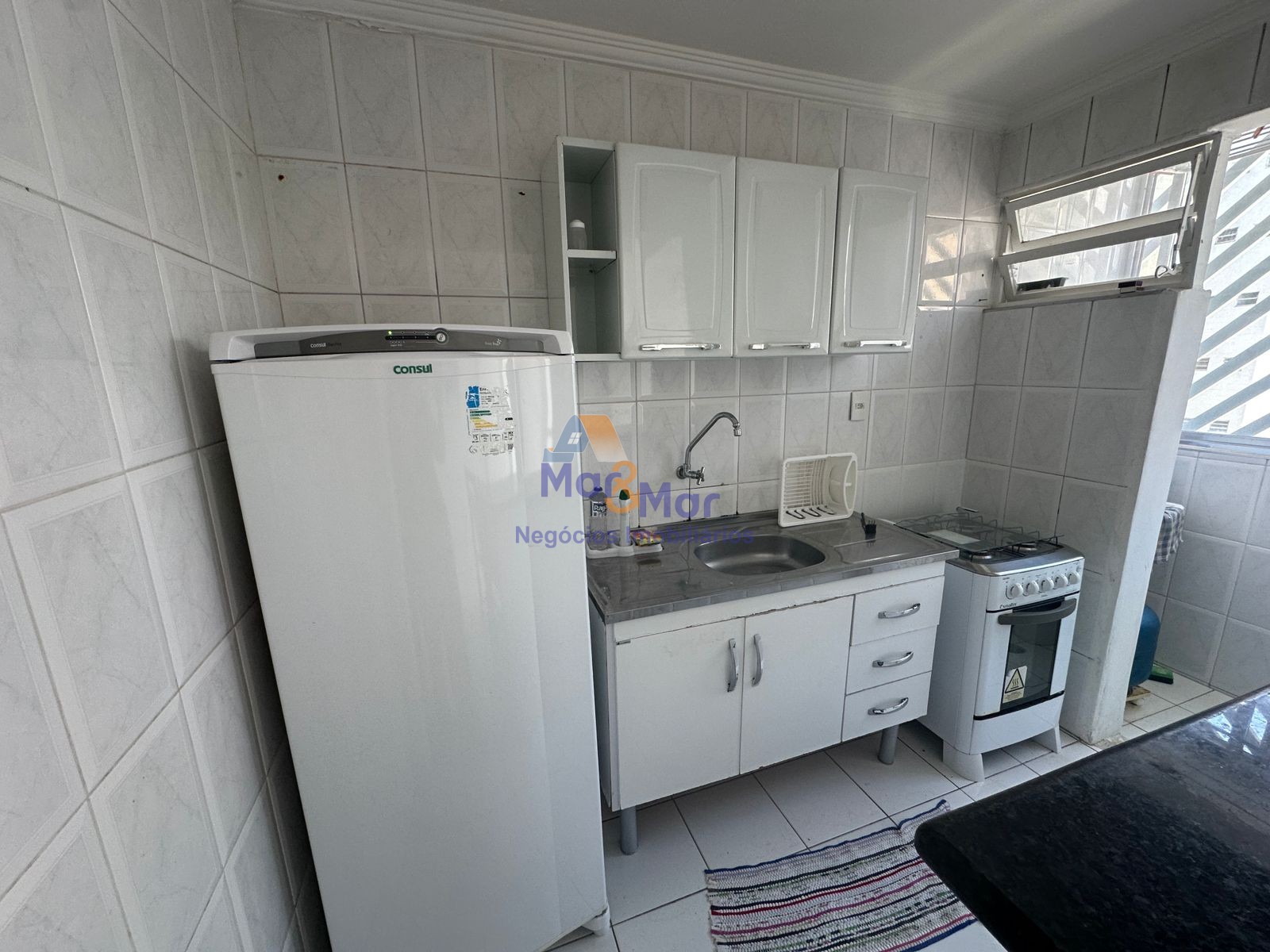Apartamento na Praia das Pitangueiras, Guarujá - SP
