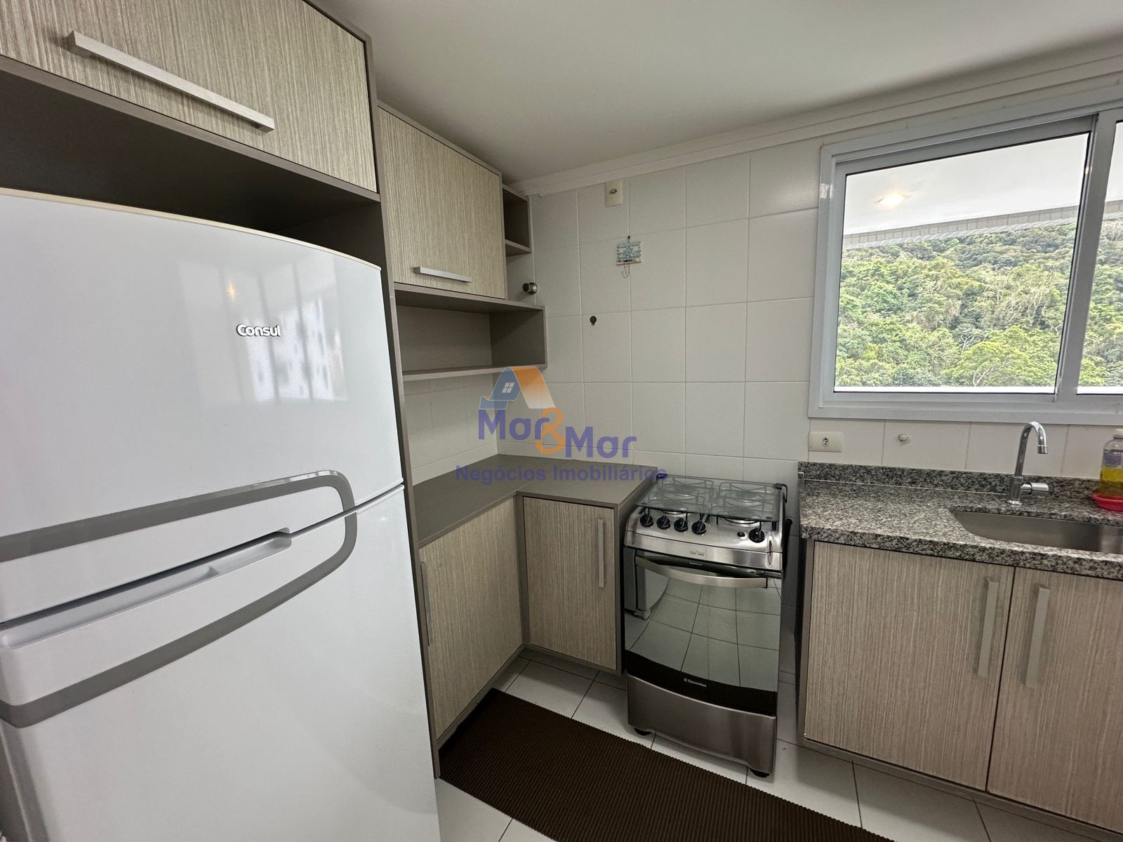 Apartamento na Praia das Pitangueiras, Guarujá - SP