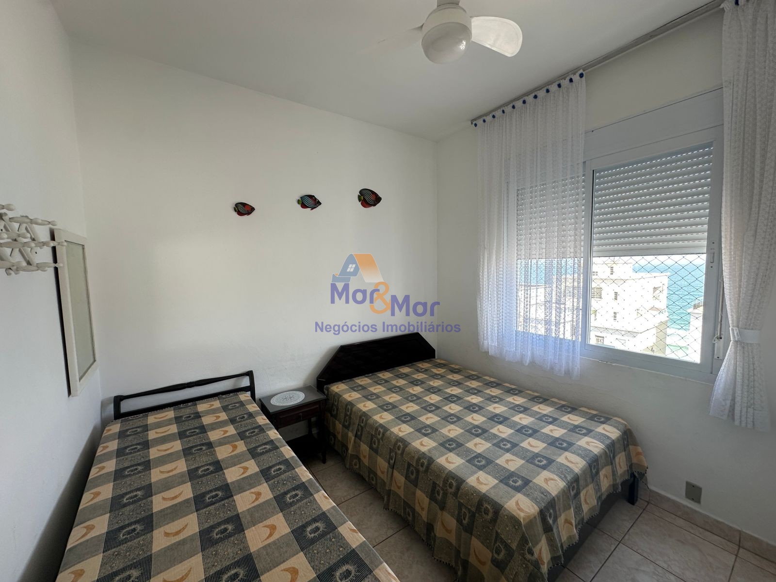 Apartamento na Praia das Pitangueiras, Guarujá - SP