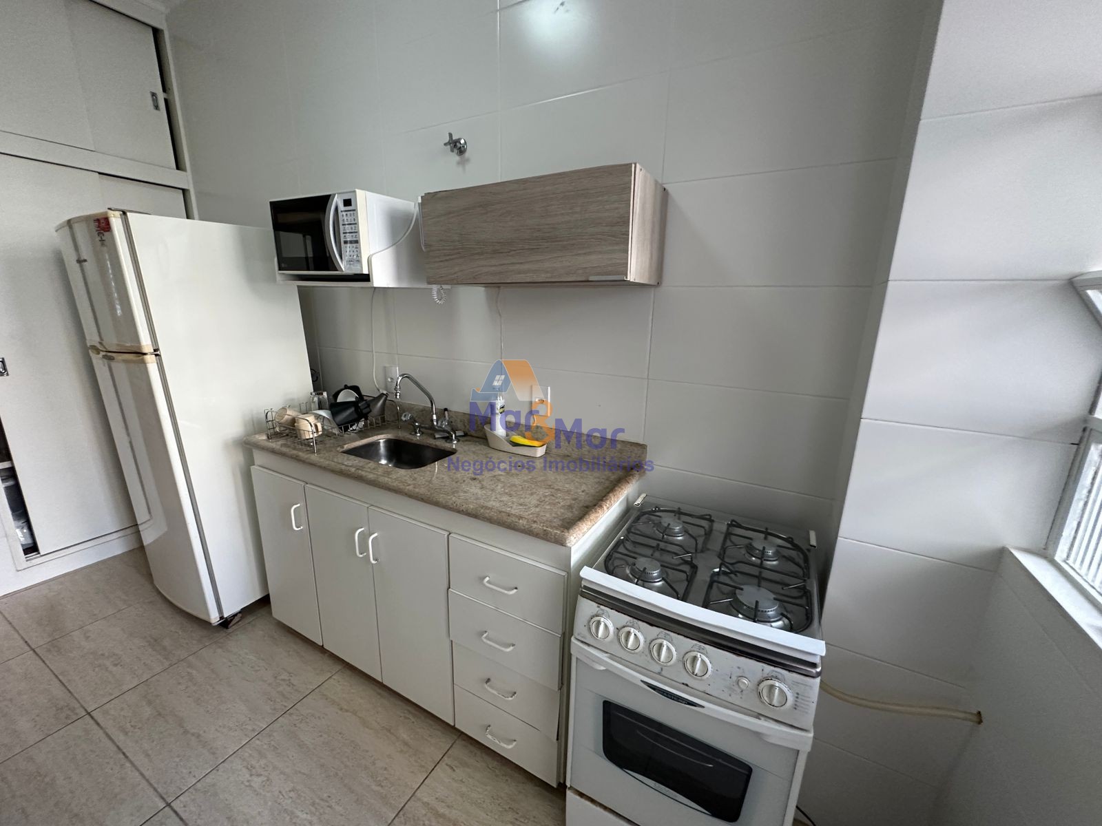 Apartamento na Praia das Pitangueiras, Guarujá - SP