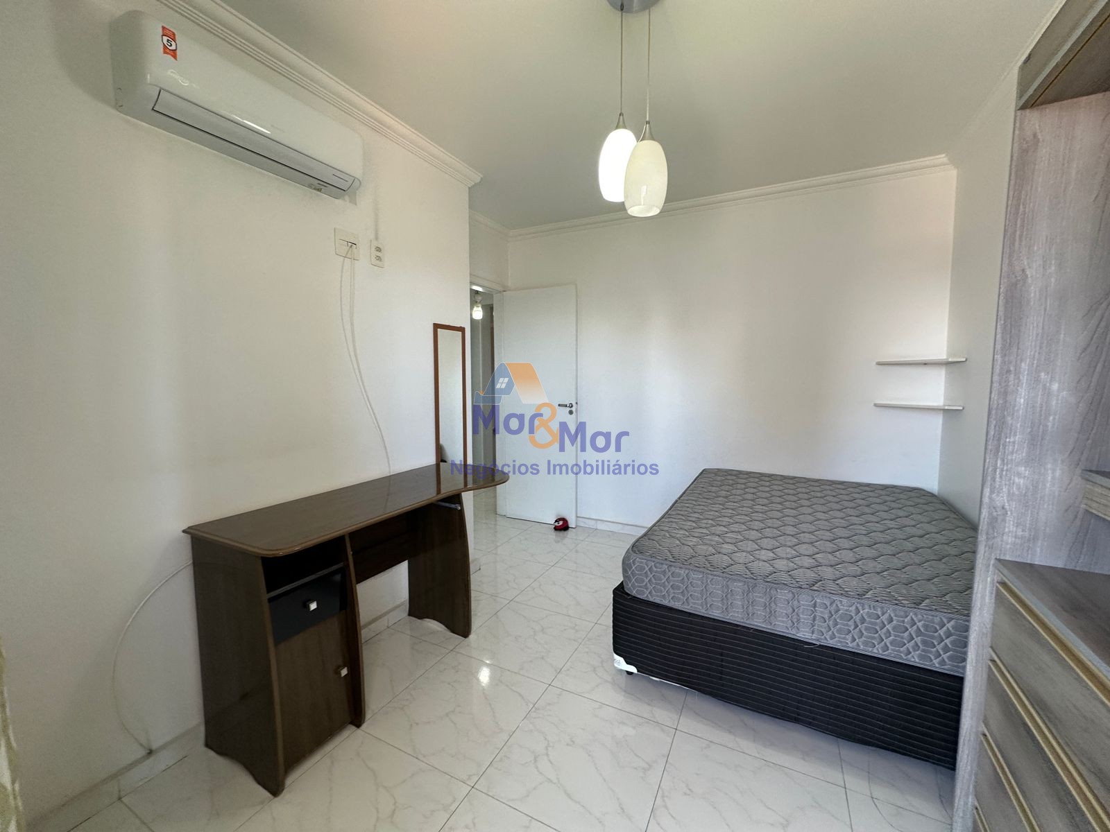 Apartamento na Praia das Astúrias, Guarujá - SP