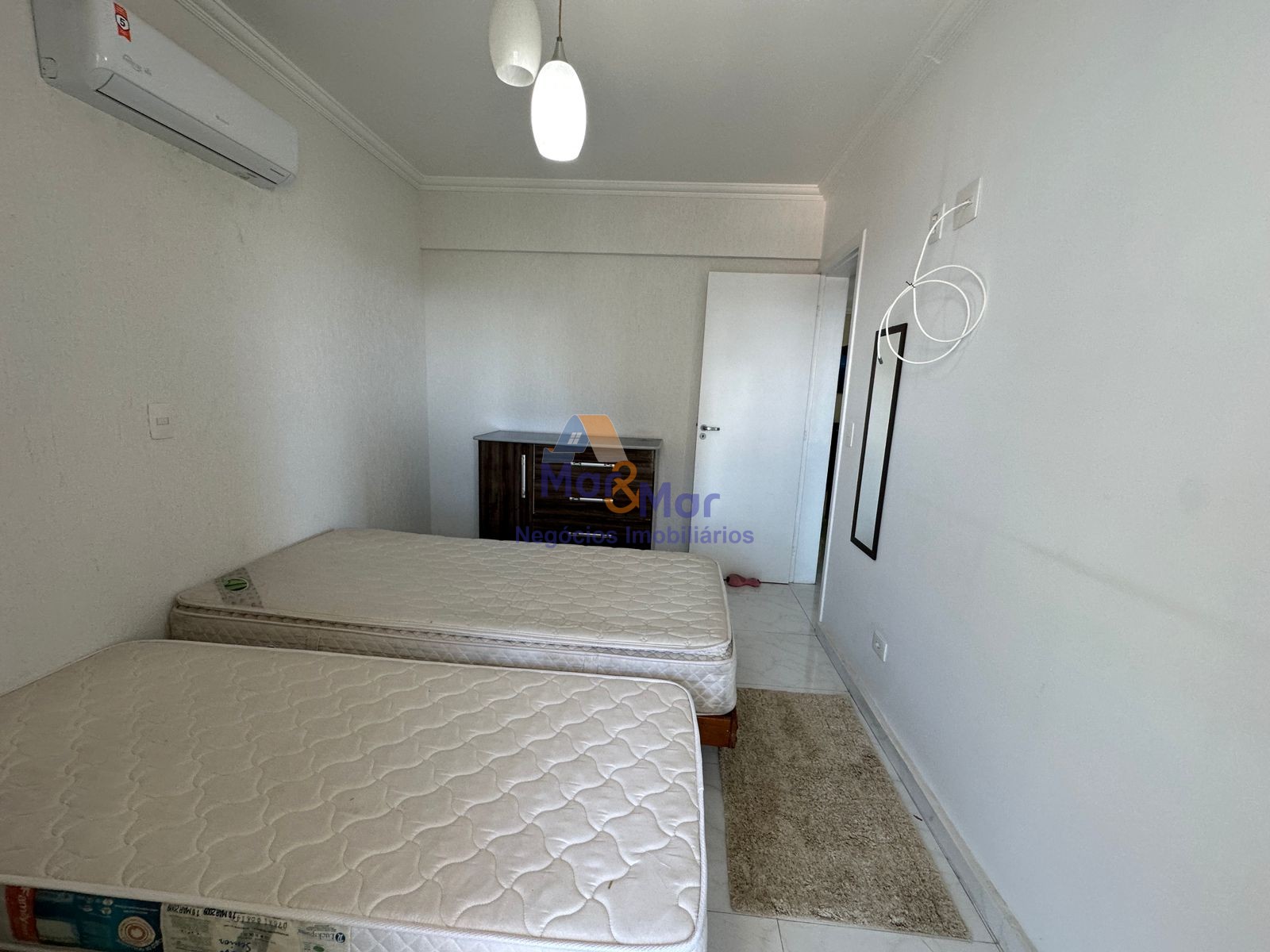 Apartamento na Praia das Astúrias, Guarujá - SP