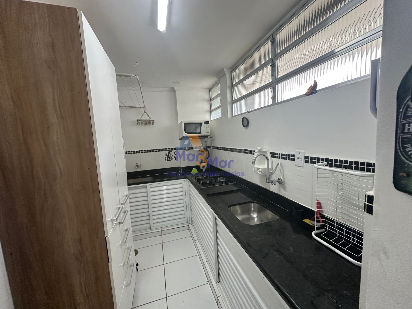 Apartamento na Praia das Pitangueiras, Guarujá - SP
