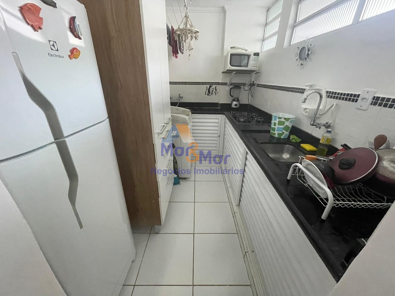 Apartamento na Praia das Pitangueiras, Guarujá - SP