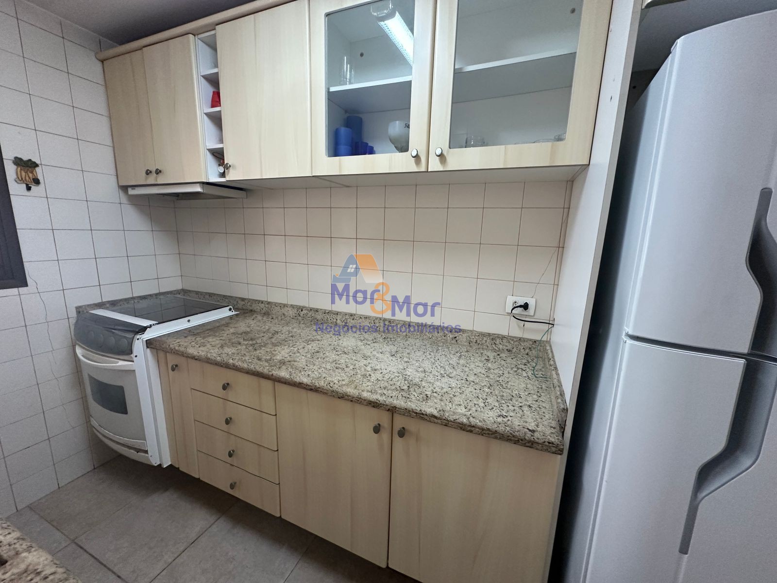 Apartamento na Praia das Pitangueiras, Guarujá - SP